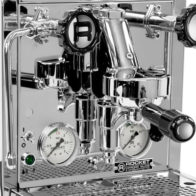 Close up image of a Chrome Rocket Espresso R58 Cinquantotto Espresso Machine with black handles and knobs