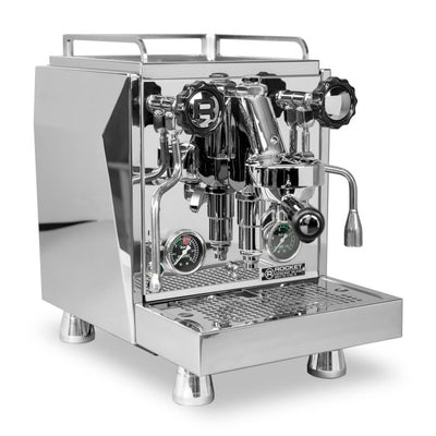 Side image of a Chrome Rocket Espresso Giotto Timer Evoluzione R Espresso Machine with black handles and knobs
