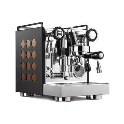 Side image of black and chrome Rocket Espresso Appartamento Espresso Machine with black handles and twelve brown dots